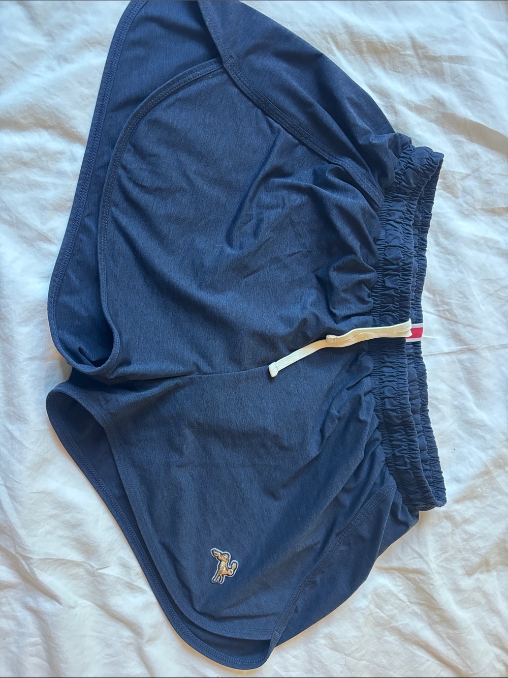 Women’s navy tracksmith session running shorts